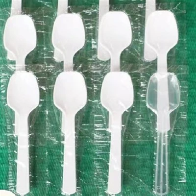 White Plastic Spoon